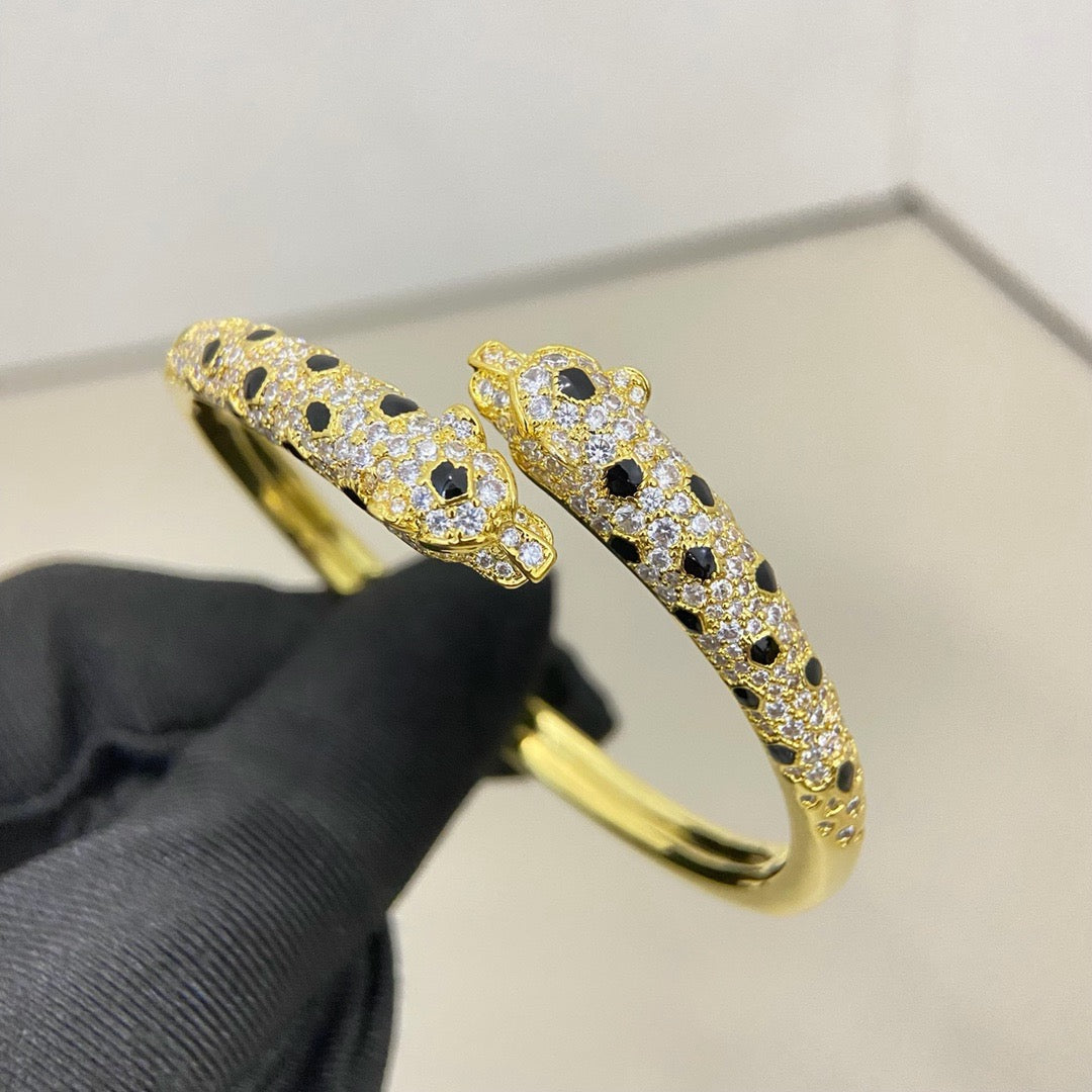 [CharmAmor]PANTHERE DOUBLE HEADED HALF DIAMOND OPEN BRACELET