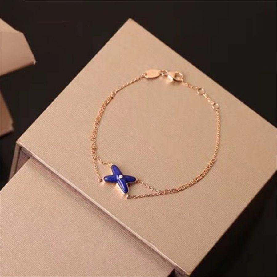 [CharmAmor]Hollow Design Four-Leaf Clover Flower Shape Ring